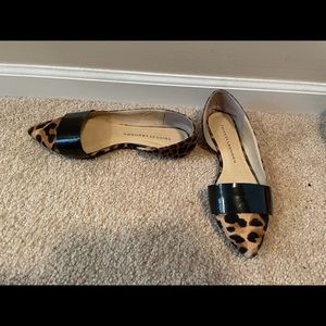 Cheetah (black and brown) flats for sale. Size 8.5. Gently used.